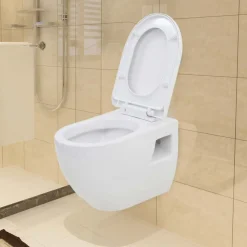 vidaXL Inodoro suspendido de pared con cisterna oculta cerámica Blanco Outlet