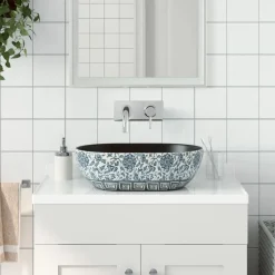 vidaXL Lavabo sobre encimera ovalado cerámica 47x33x13 cm Negro y azul