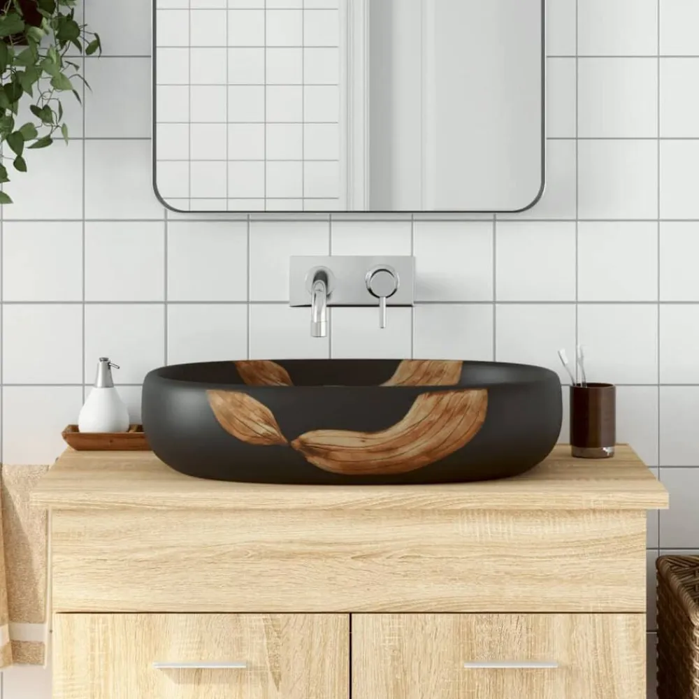 vidaXL Lavabo sobre encimera ovalado cerámica negro 59x40x14 cm Negro y marrón Hot
