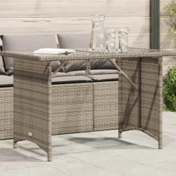 vidaXL Mesa de jardín superficie de vidrio ratán PE 110x68x70 cm Gris Hot