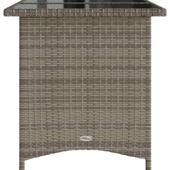 vidaXL Mesa de jardín superficie de vidrio ratán PE 110x68x70 cm Gris Hot